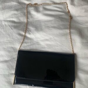 Elegant Black Patent Leather Clutch with Gold Chain and Detailing